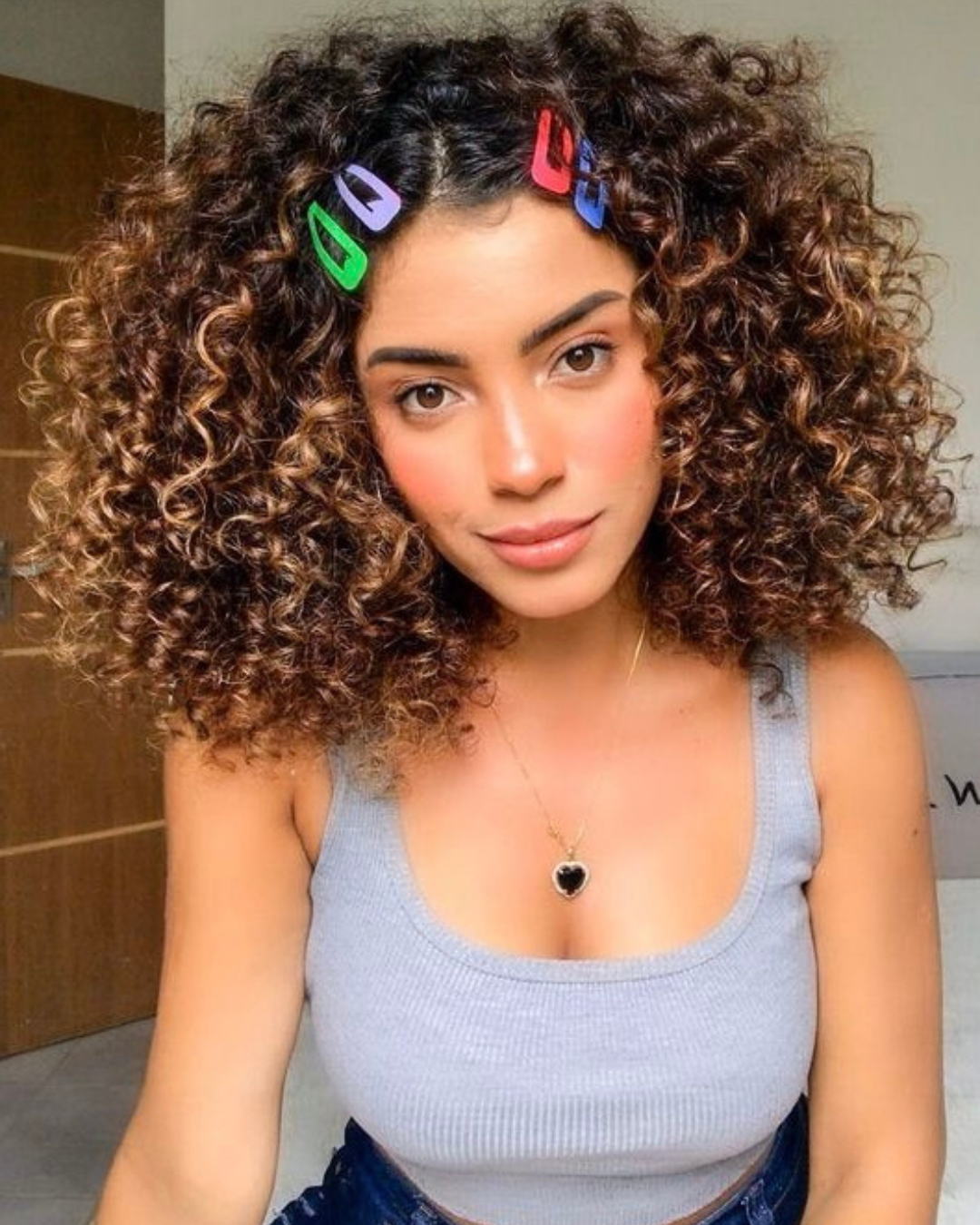 styling capelli ricci mollette